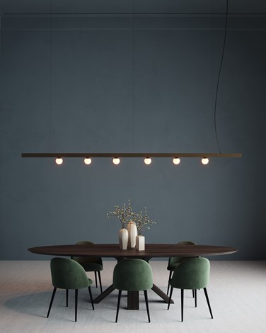 Suspended linear lighting combined with spherical lights under a modern dinning table in a living room