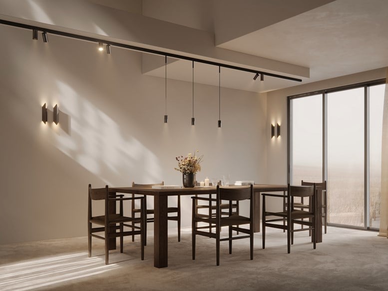 Combination of wall and ceiling lighting in a dining room
